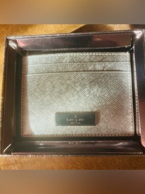 NWT and glittery gift box Kate Spade New York Kenzie metallic slim card holder